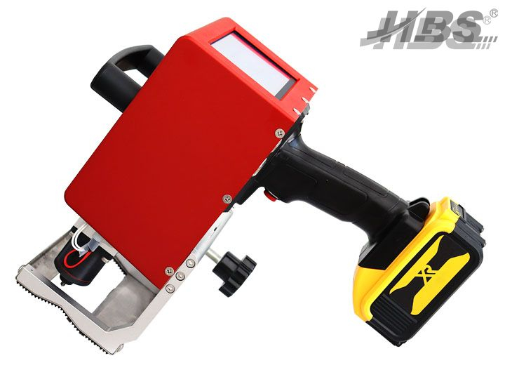 Portable dot peen marking machine in action on heavy metal